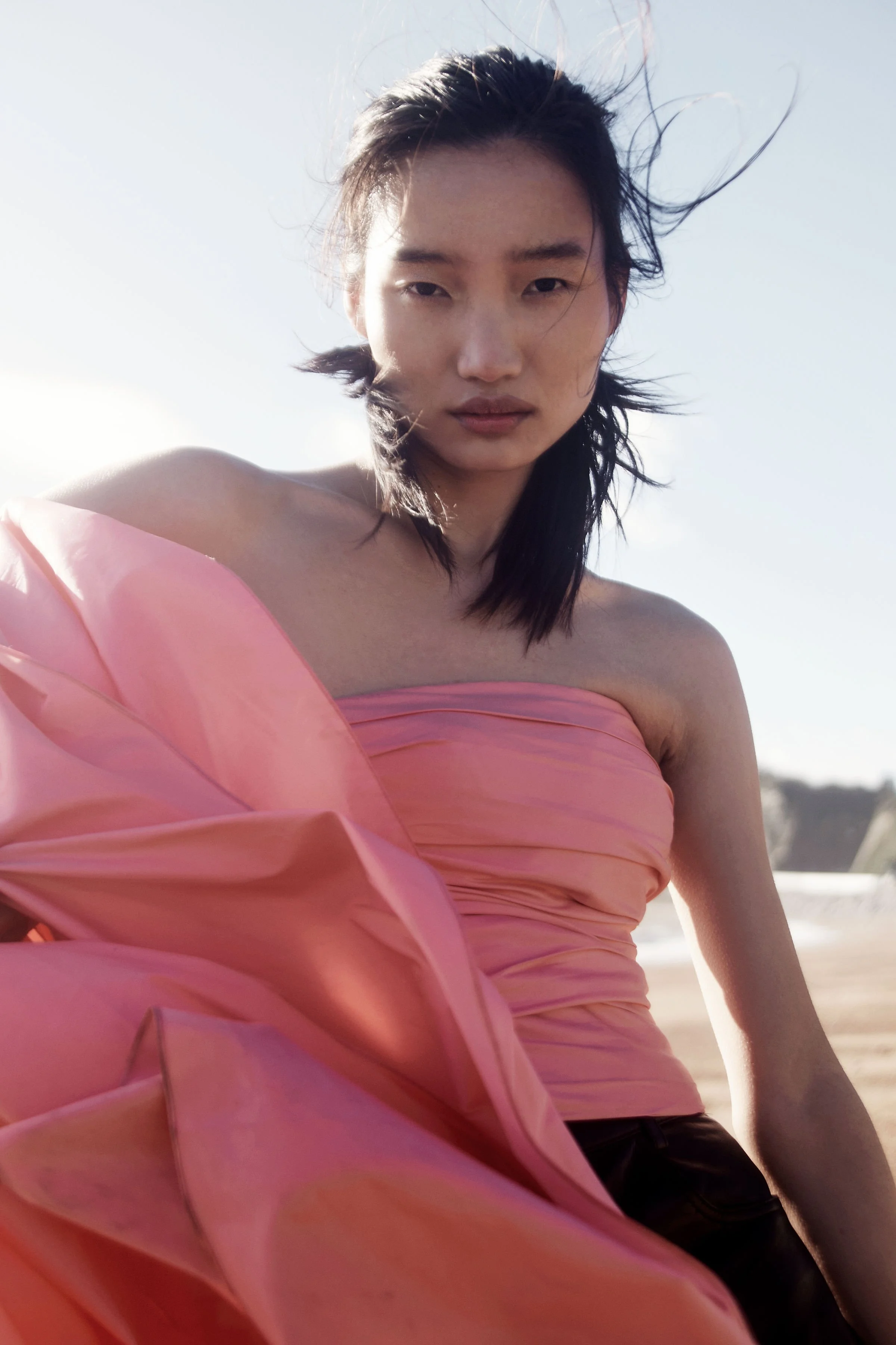River Nile for Overdue Magazine — Coral silk wrapped across the body