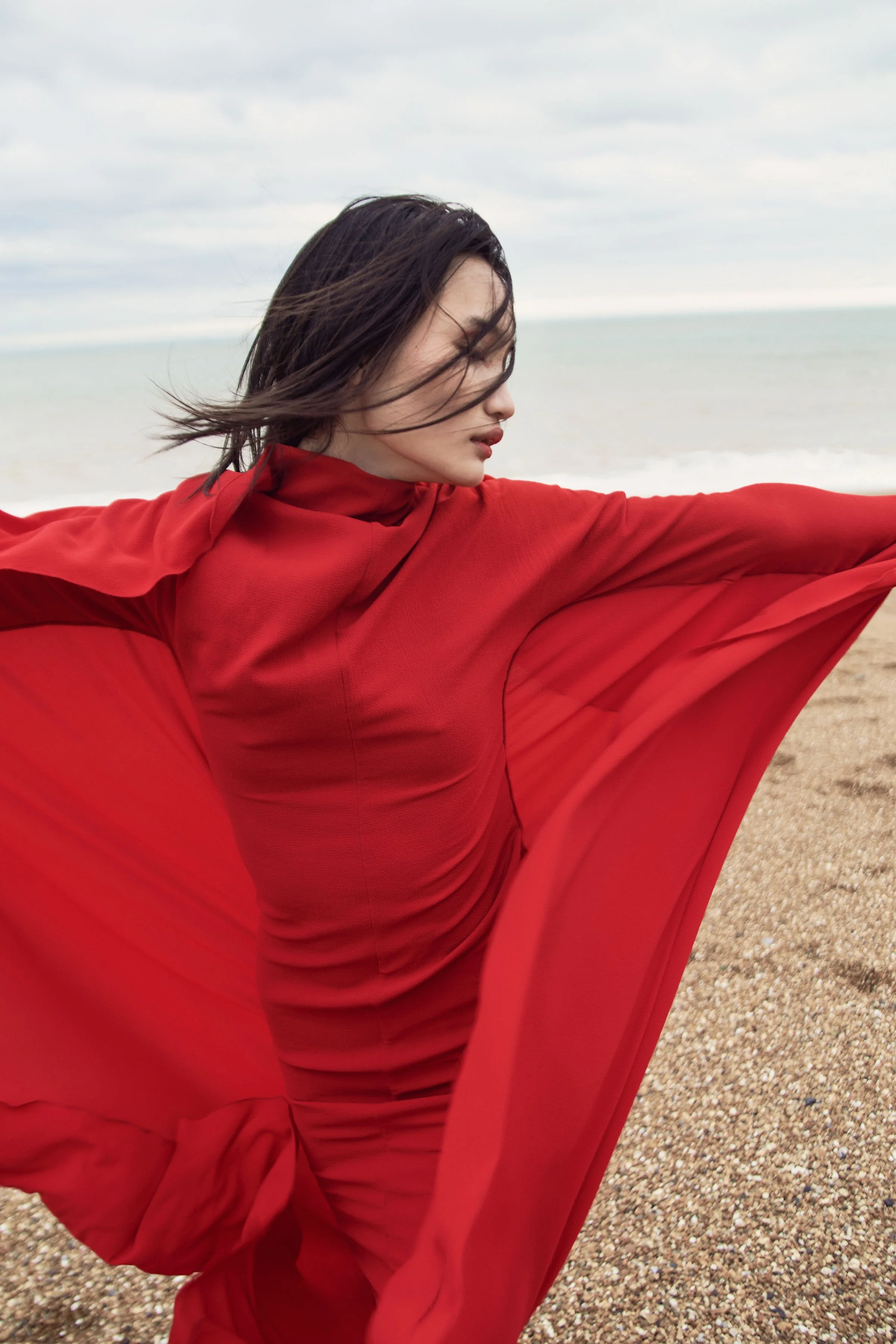 River Nile for Overdue Magazine — Red silk caught full width against the sea