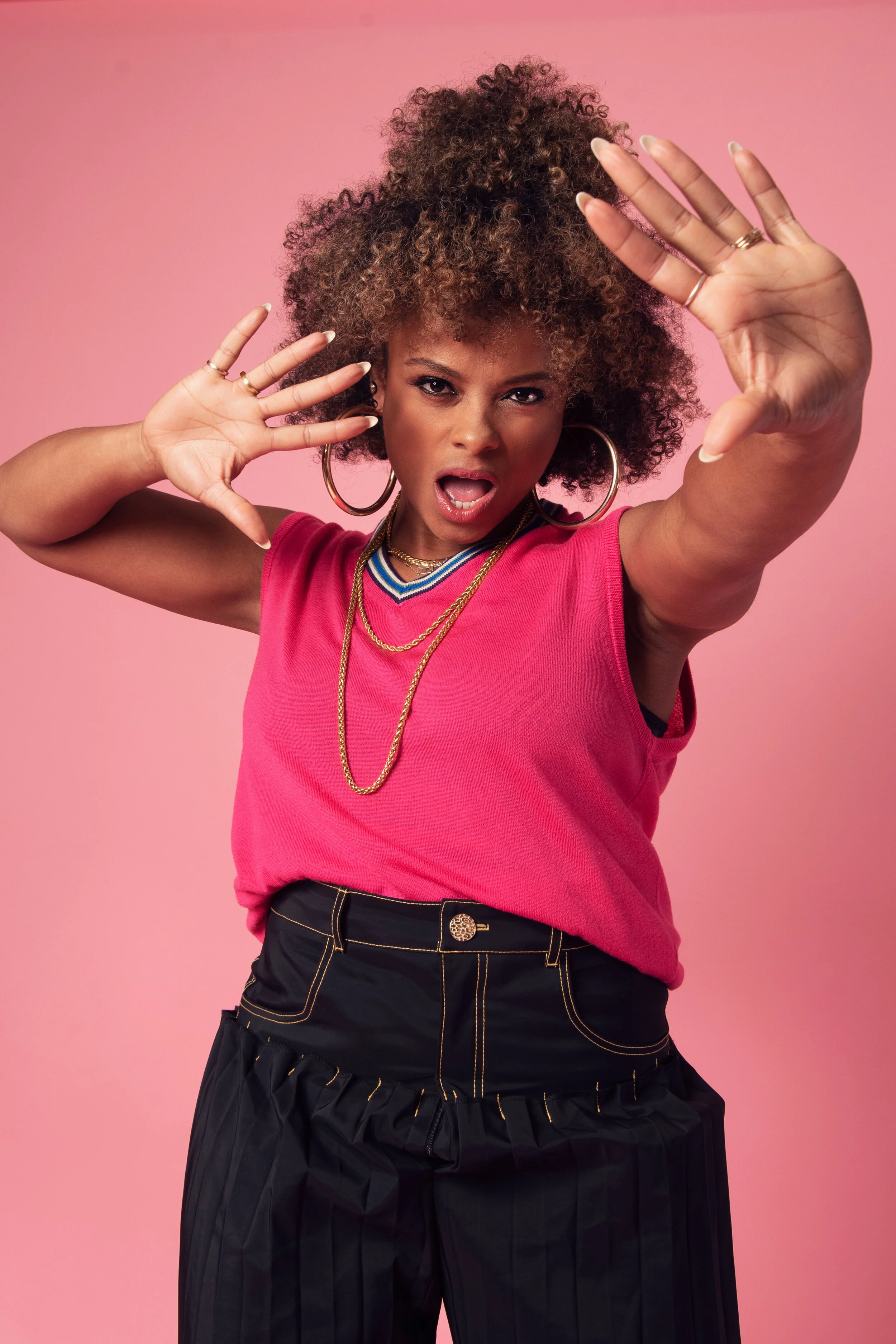 Fleur East for Darkus Magazine — Hands forward, mouth open