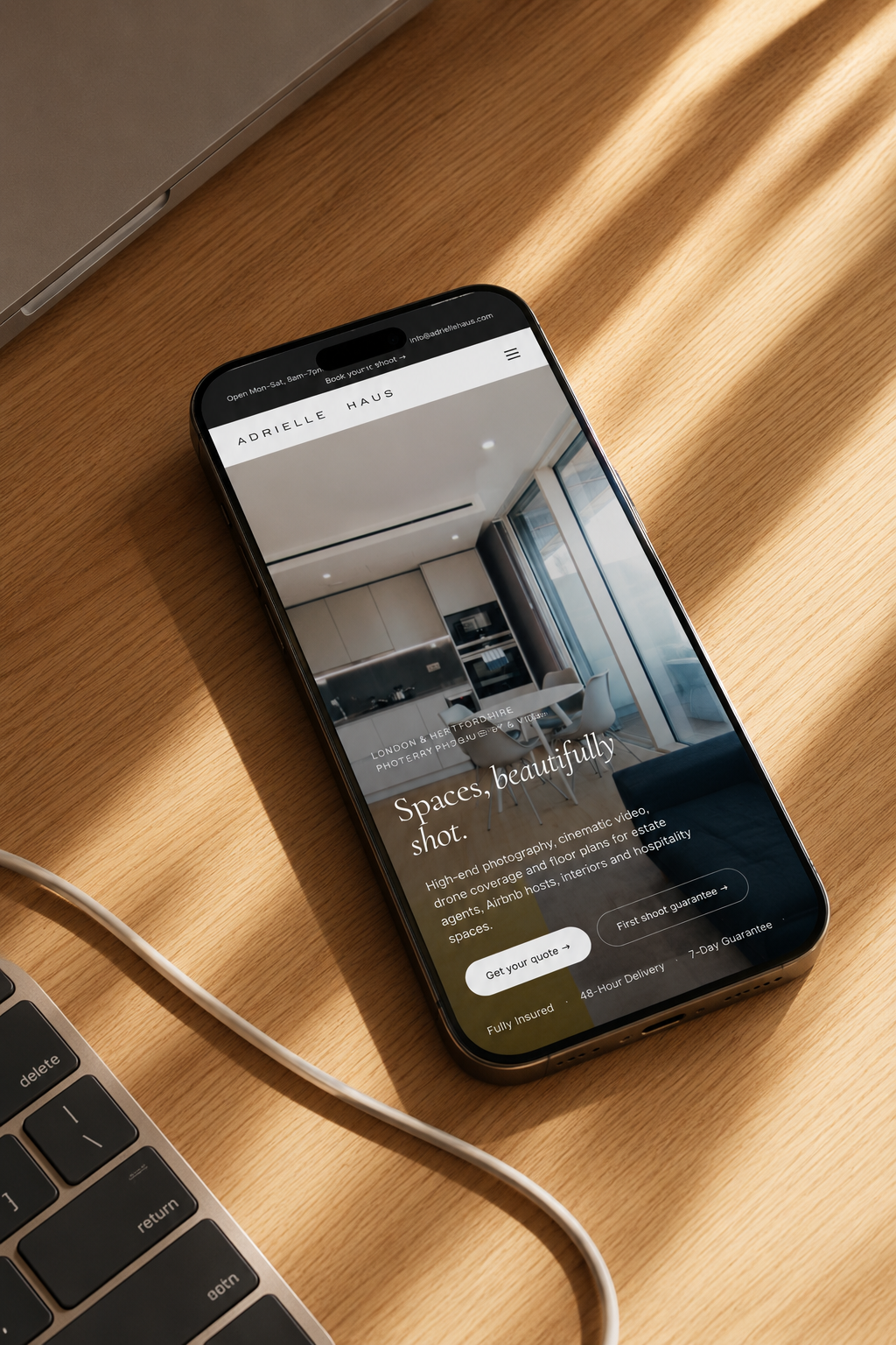Adrielle Haus — homepage on mobile