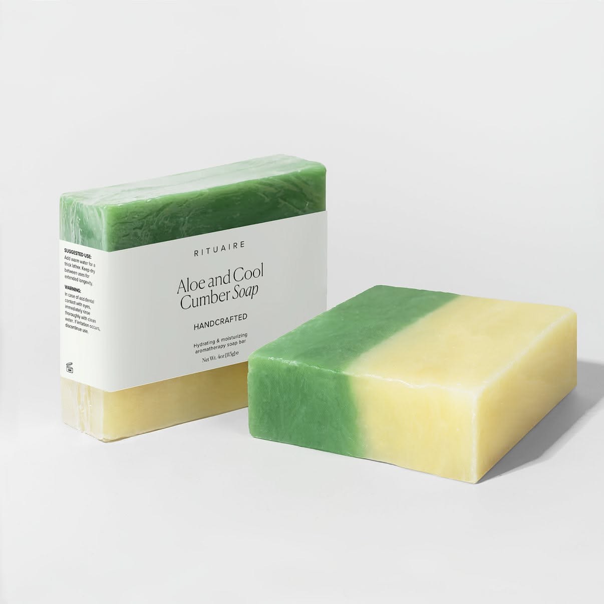 Rituaire printed sleeve beside the bare soap bar